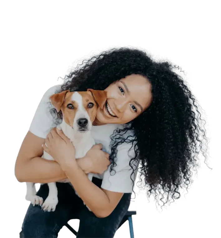 A client holding her dog close, the moment a consent conversation is really about